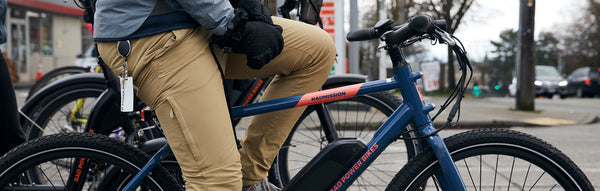 A rider waits at a stoplight on his RadMission electric metro bike.