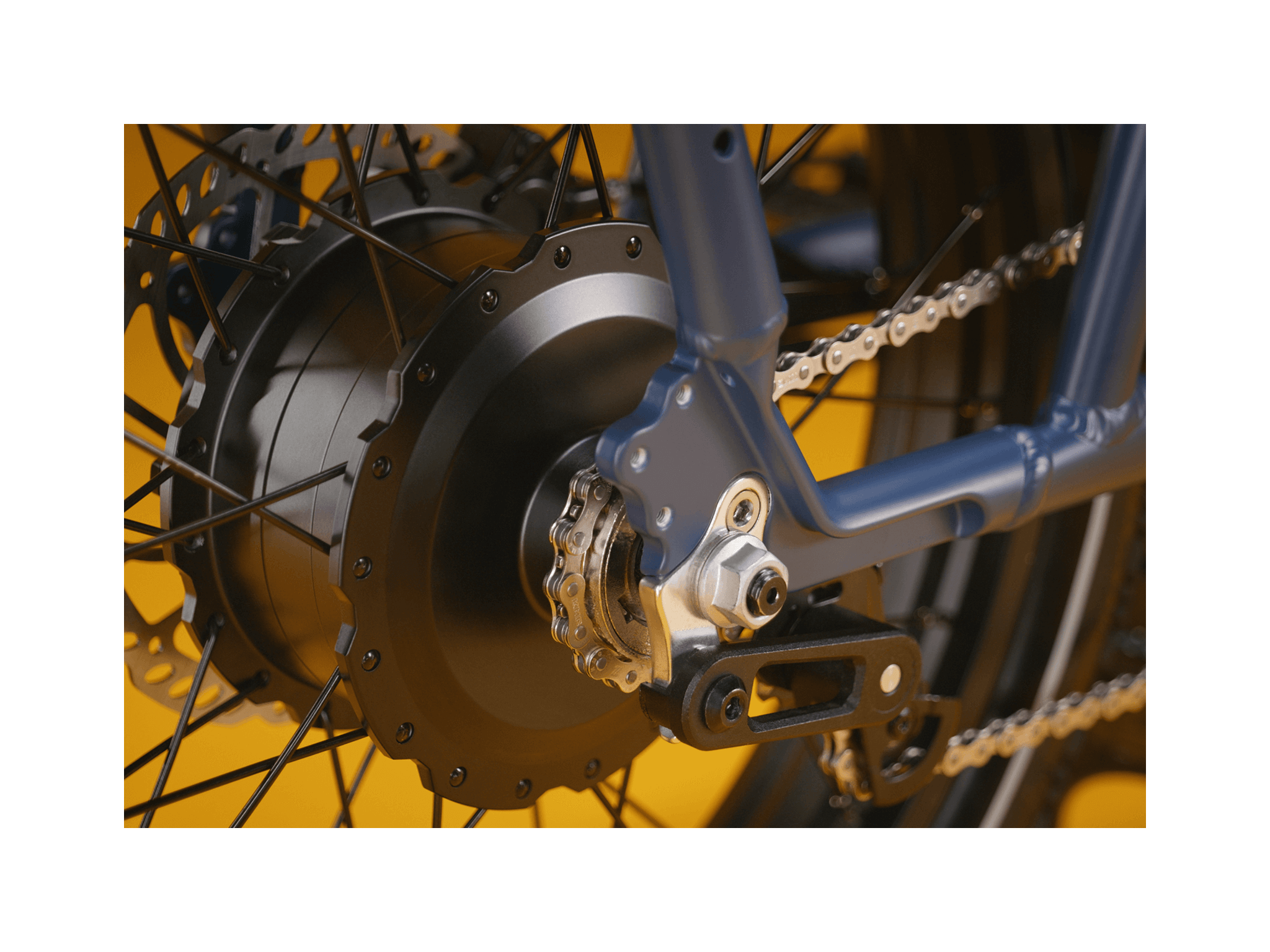 Detailed shot of a blue ebike with a black motor and silver bike chain.
