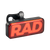 Close up picture of Rad Power Bikes Rad logo taillight not on a bike where you can see part of the mounting strap.