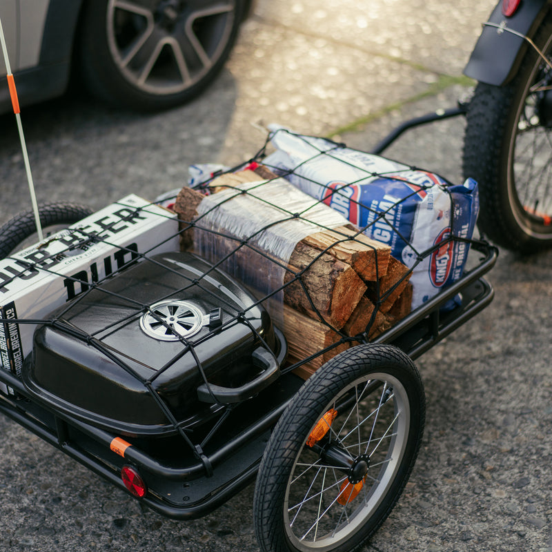 Rad Trailer loaded with barbeque supplies and secured using the Rad Cargo Net.